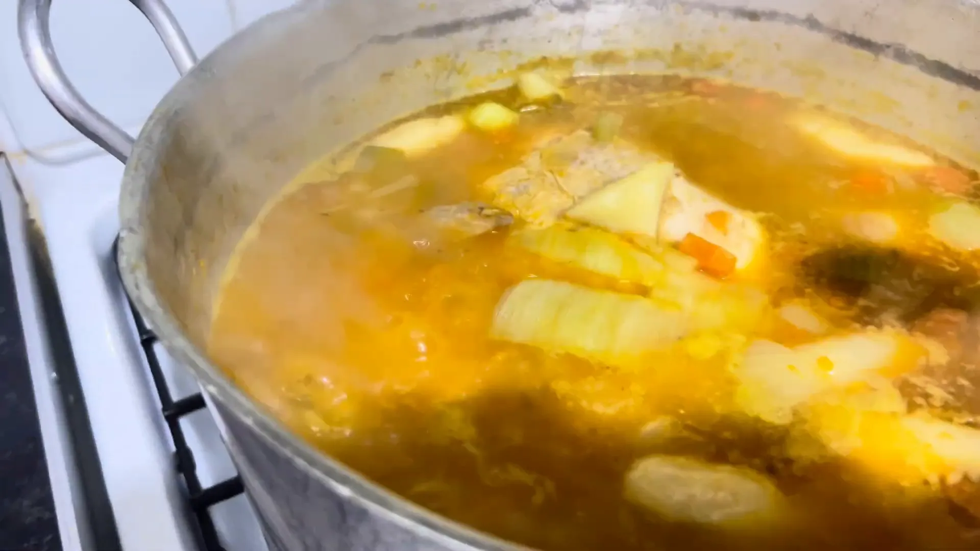 Simmering chicken soup