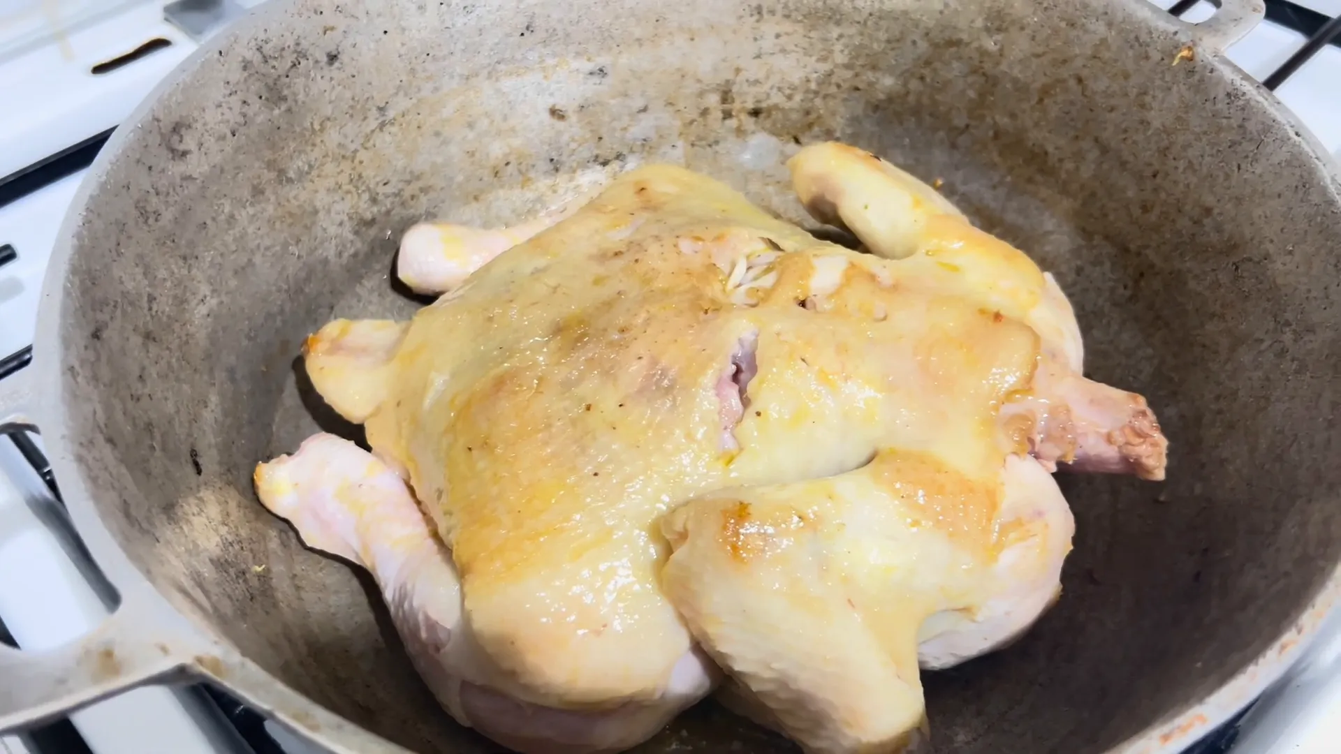 Adding whole chicken to the pot