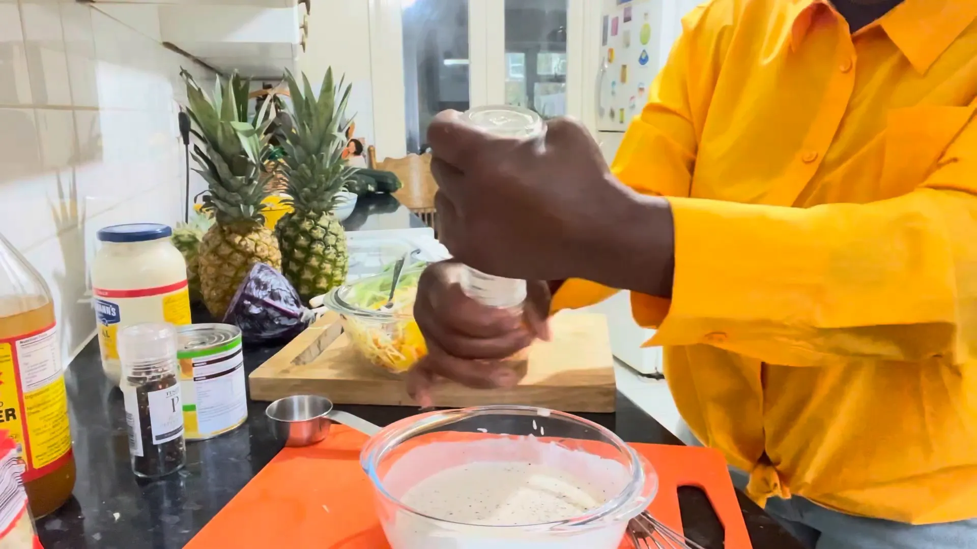 Adding seasoning to the dressing