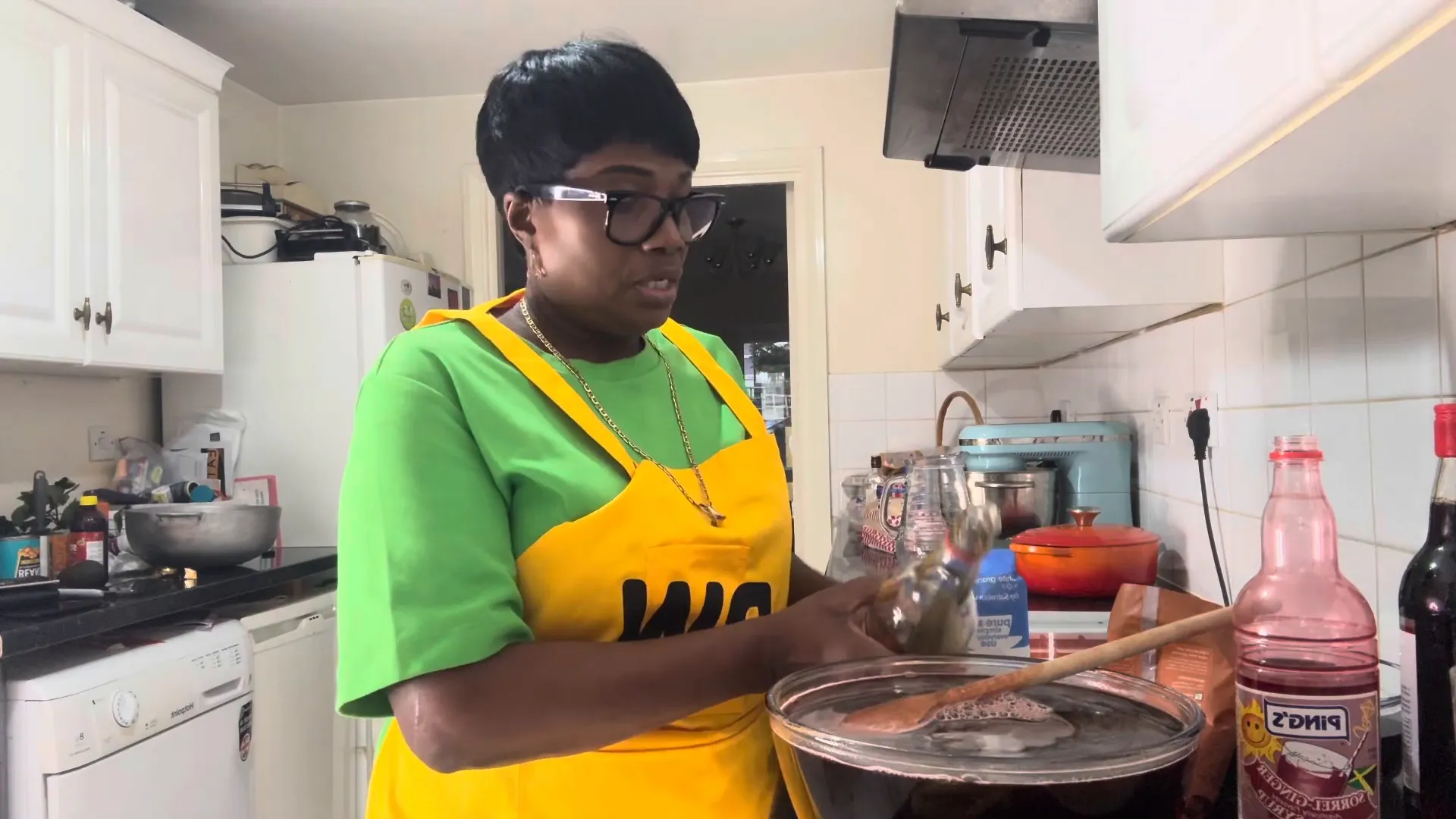 Pouring rum into the sorrel