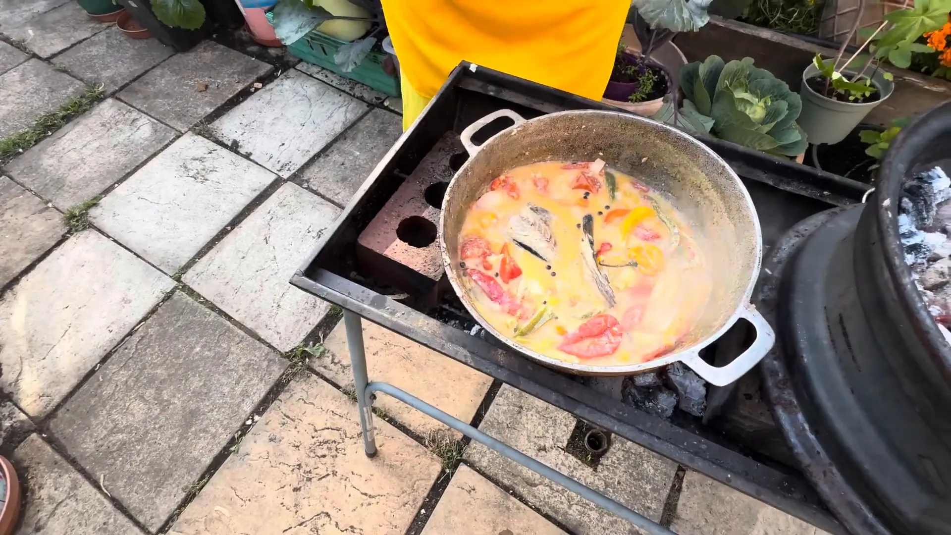 Adding mackerel to the coconut mixture
