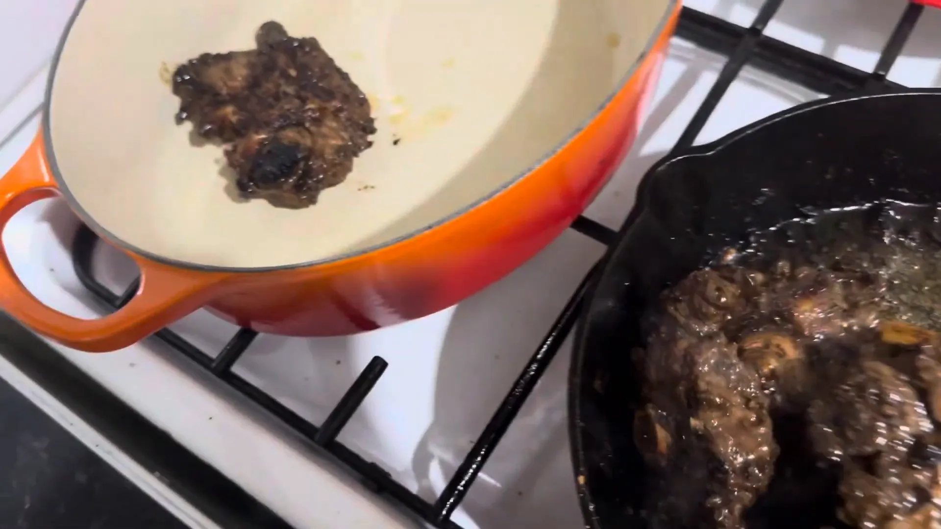 Searing oxtail in a pan