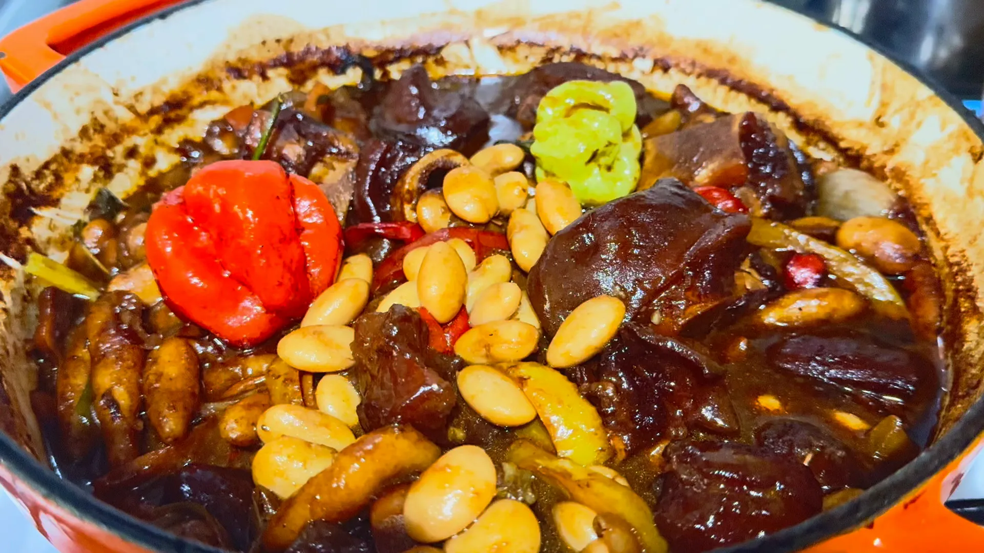 Final dish of cow foot with butter beans