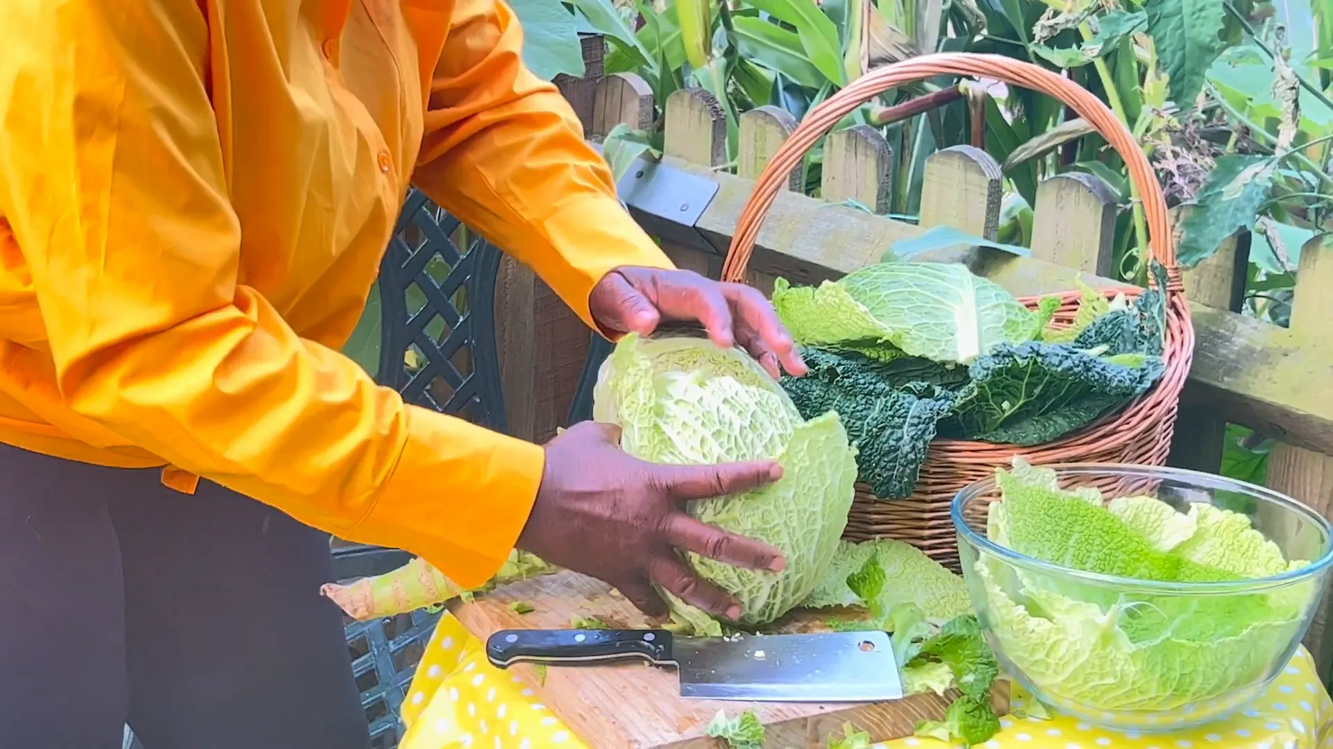Donna cutting open the cabbage, ready to share
