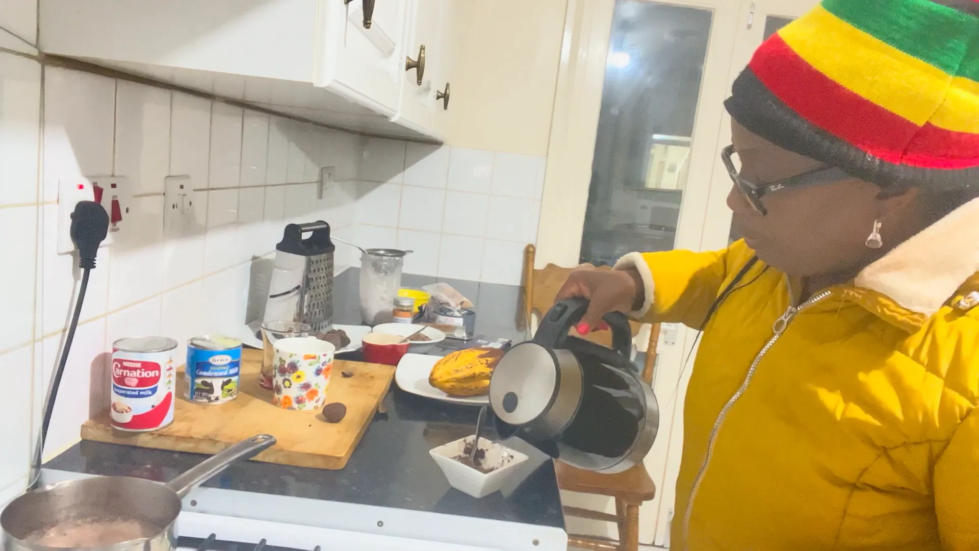 Grinding cocoa beans into powder