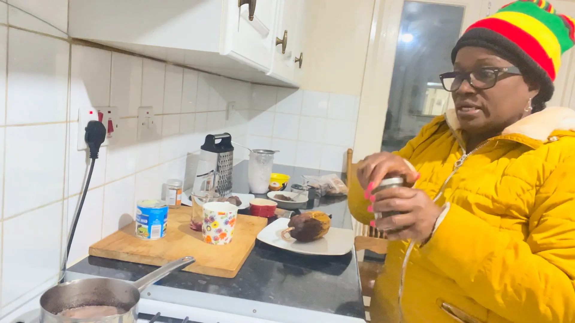Adding spices to the chocolate tea pot