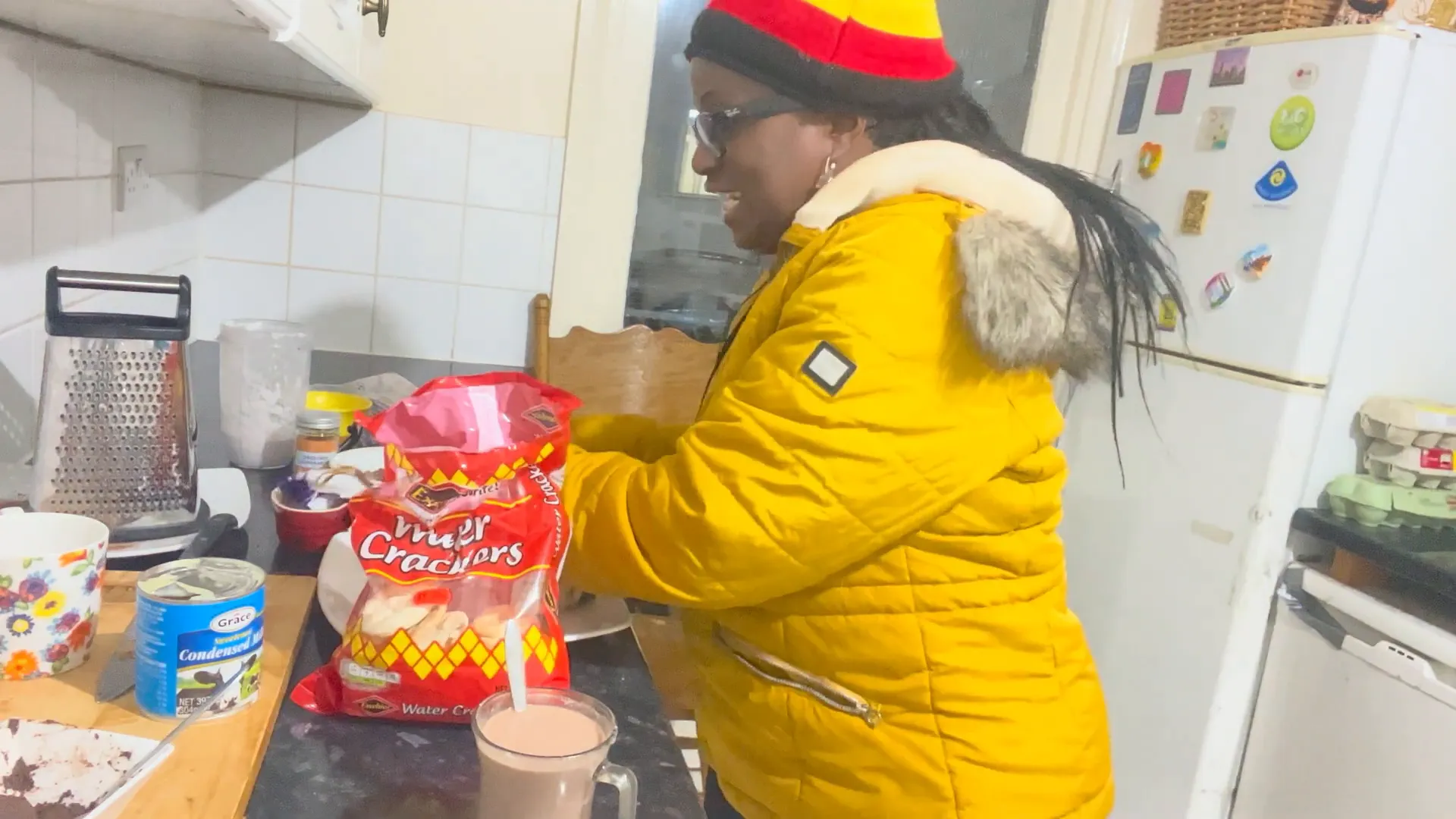 Serving chocolate tea with Jamaican crackers