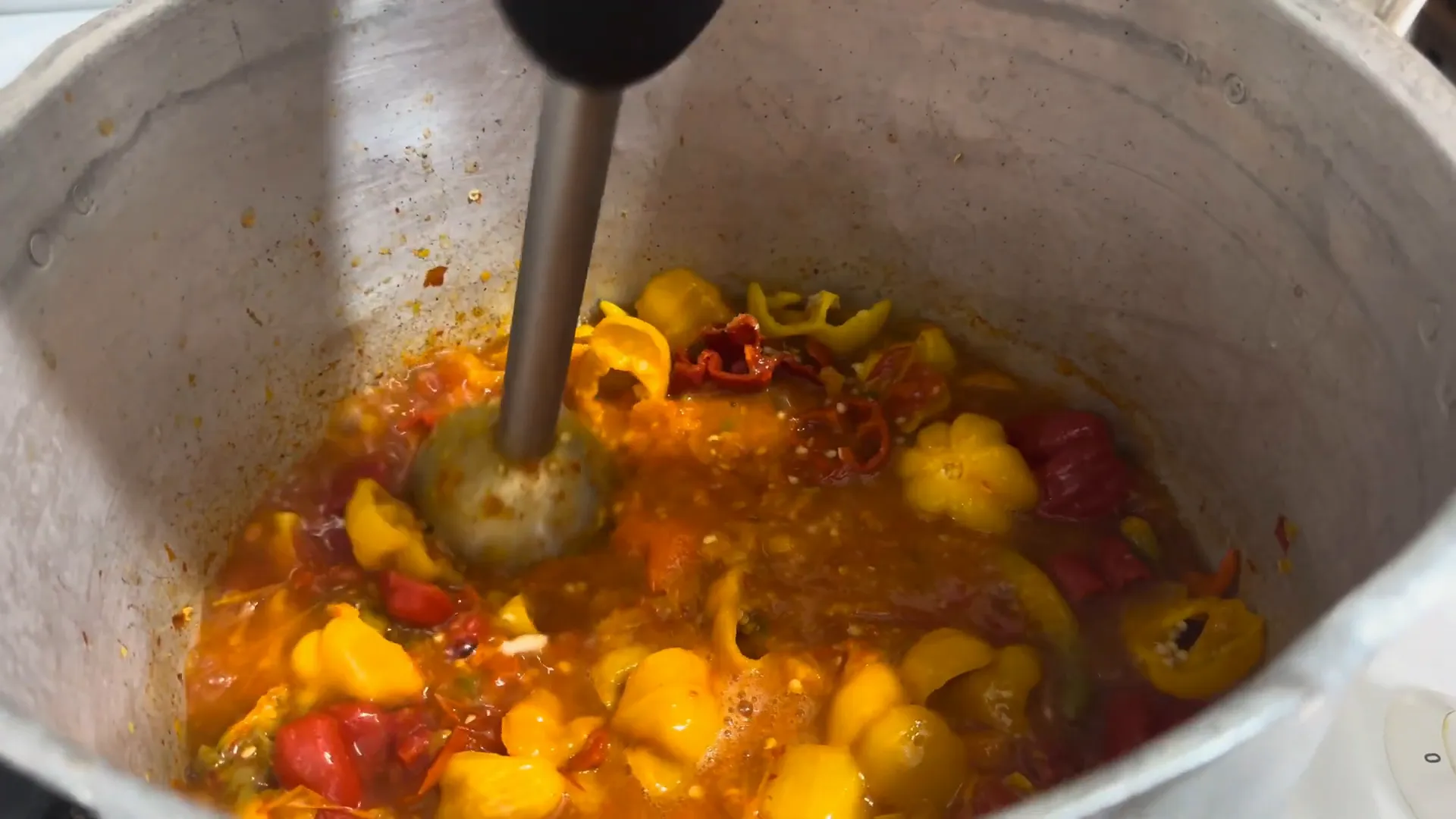 Blending the cooked peppers