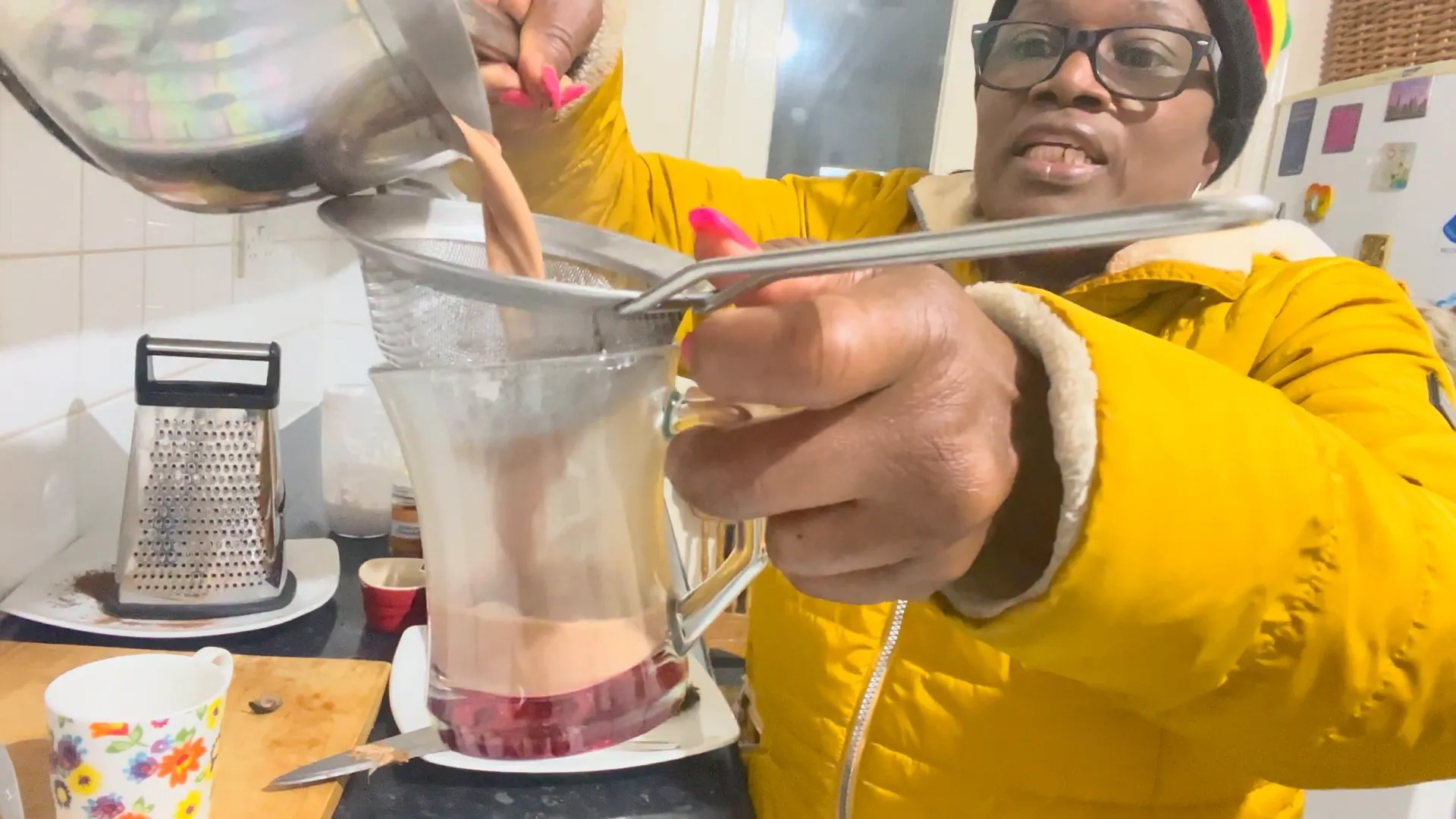 Straining the chocolate tea